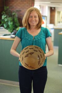 The author holding the butterfly basket bowl.